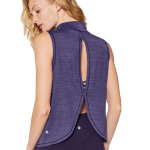 Lululemon Twist & Reach Mock Neck Tank
Heathered Aeon Fits Like 6/8 Med